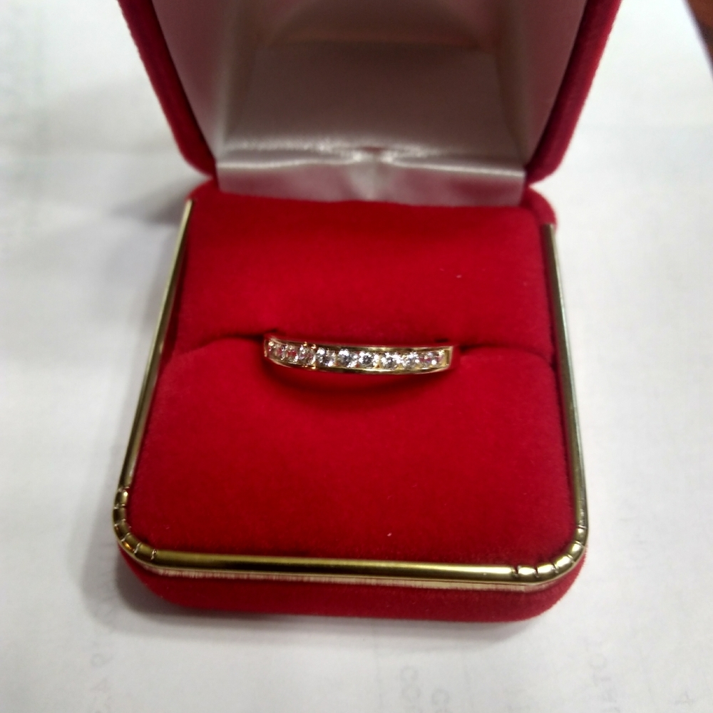 Wedding band 14kt size 9 1/2  .75 ct 11 channel se